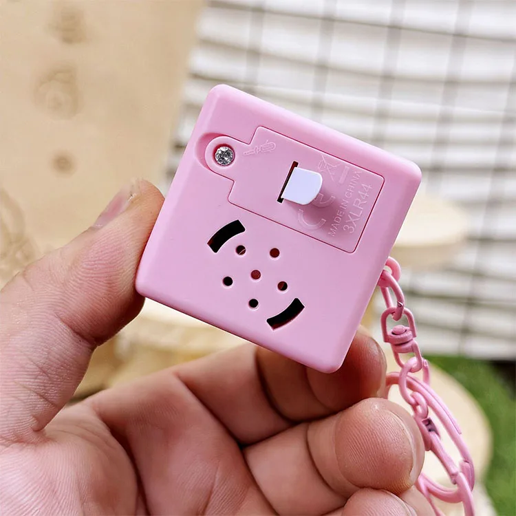 Luminous Cartoon Dinosaur Keychain with Sound Button and Decompression Features - Image 4